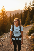 1. Emily hiking on mountain trail — Light blue UGC