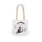 White coffee tote with beige handles, “STAY GROUNDED” graphic and coffee mug front