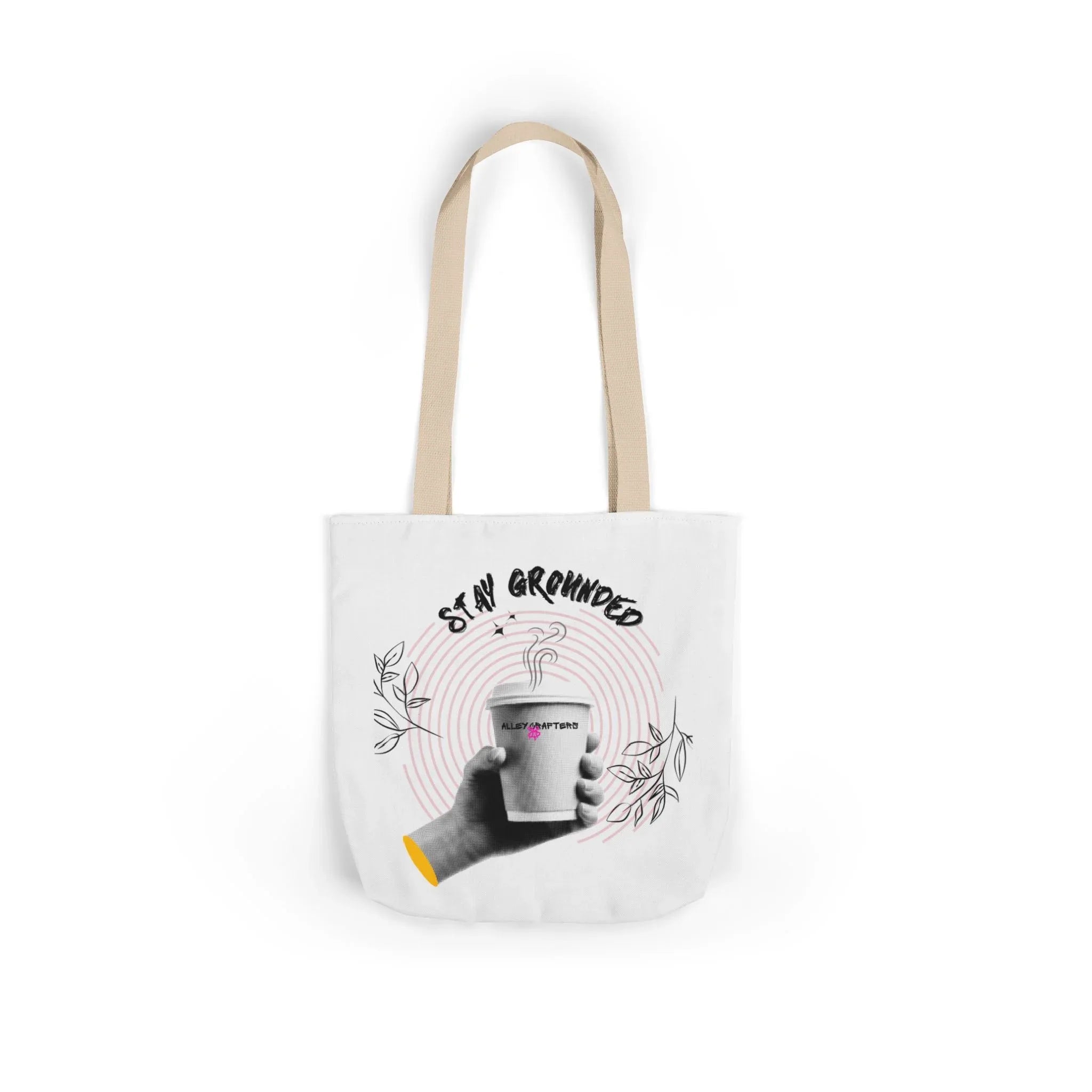 White coffee tote with beige handles, “STAY GROUNDED” graphic and coffee mug front
