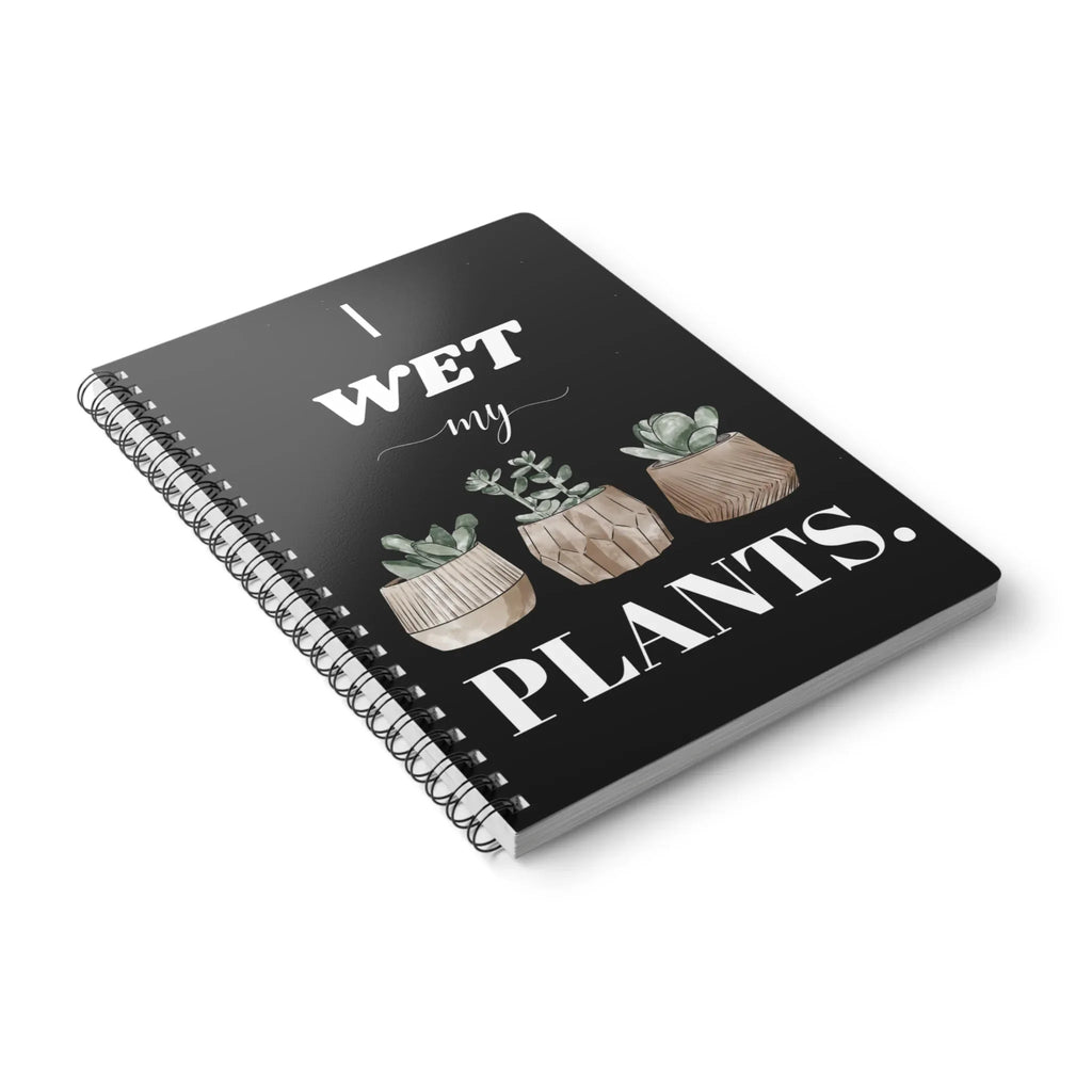 A5 spiral notebook angled, black cover with “I wet my plants” and succulent pot graphics.