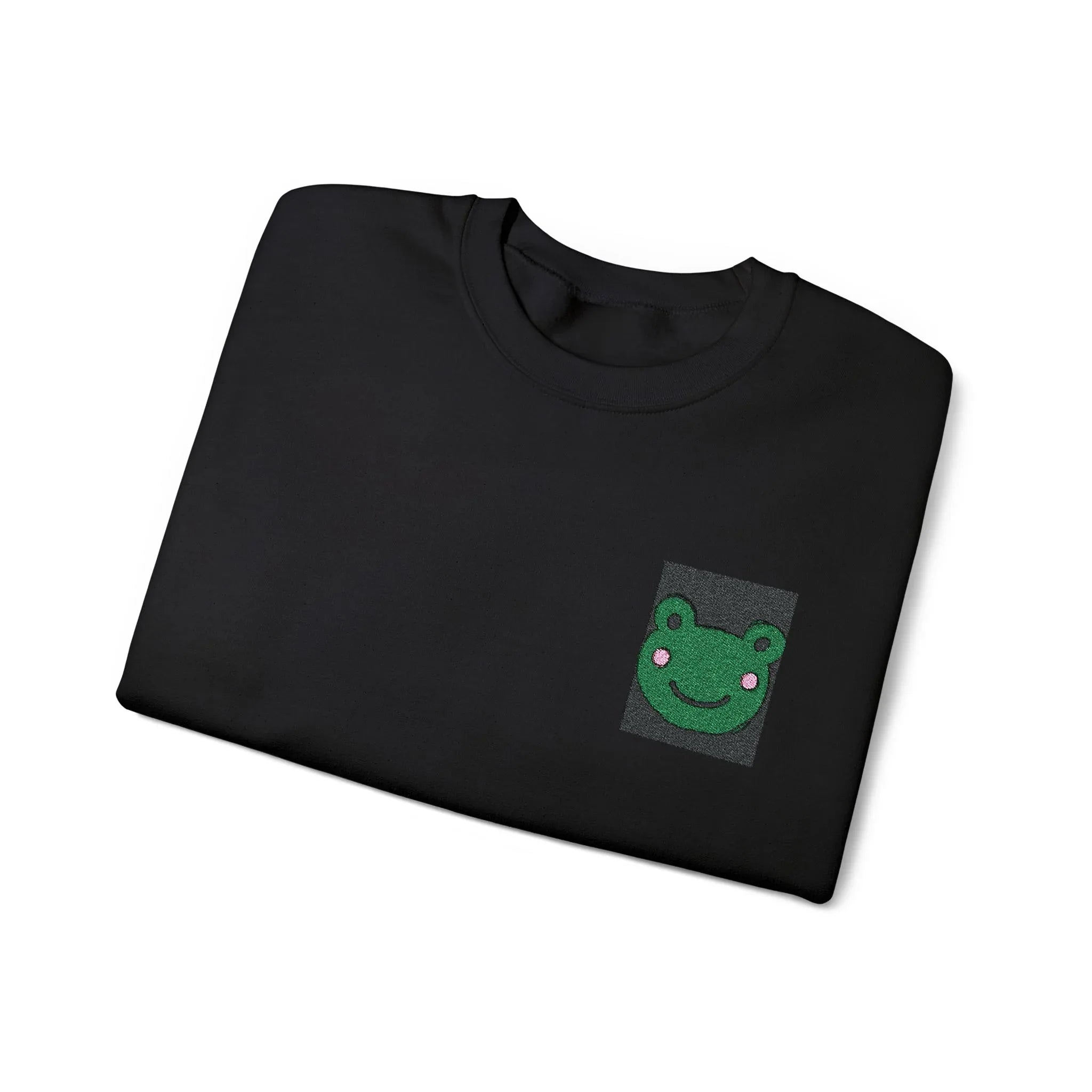 Black sweatshirt with embroidered green frog face patch at the left chest