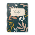 A5 spiral notebook with teal cover, botanical pattern, and label reading My Thoughts, Unfiltered