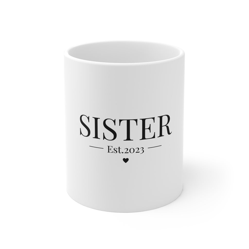 White ceramic mug with SISTER Est.2023 text and heart