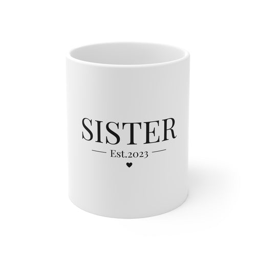 White ceramic mug with SISTER Est.2023 text and heart