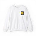 White crewneck sweatshirt with embroidered smiley heart patch on chest