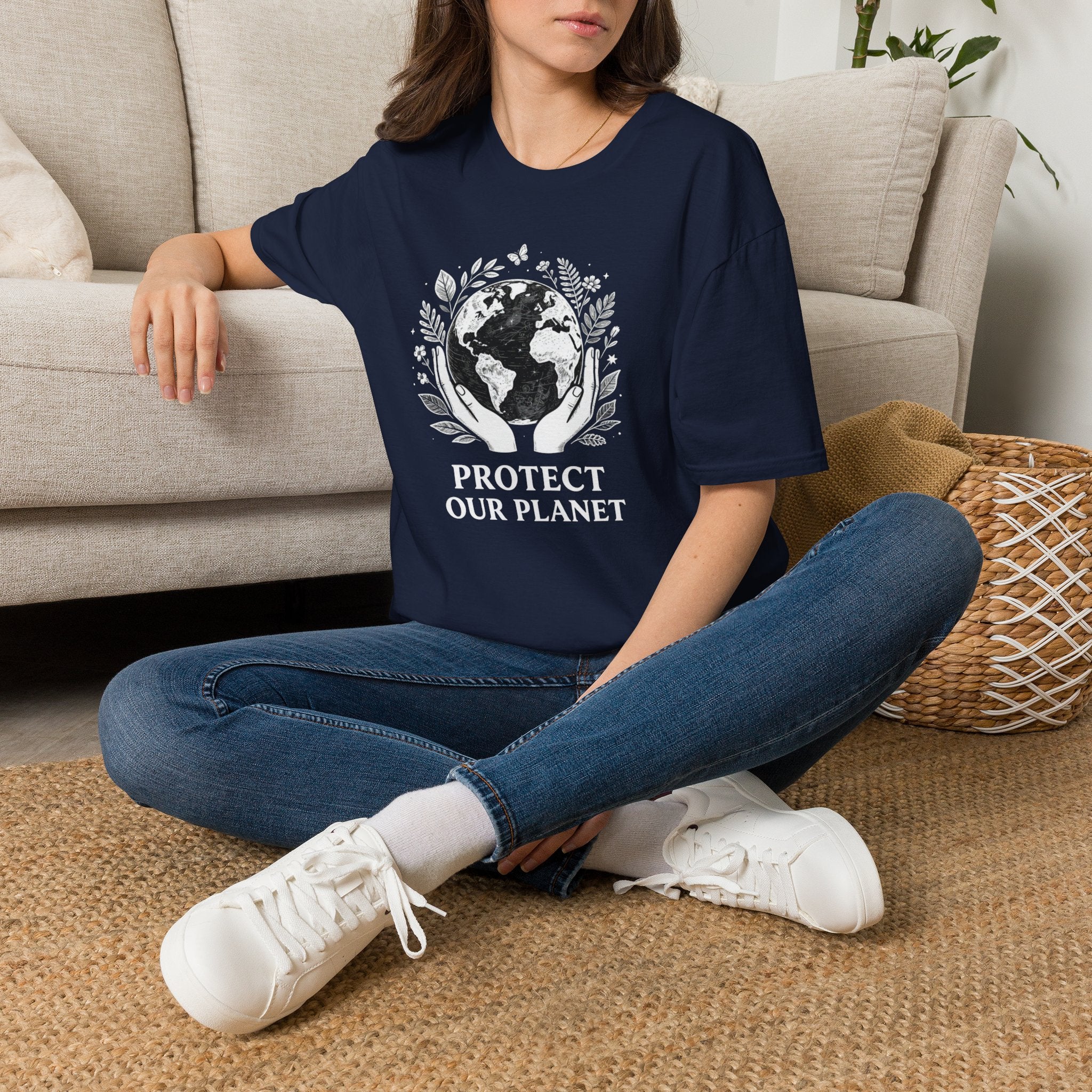Navy T-shirt with globe laurel graphic: 'PROTECT OUR PLANET'