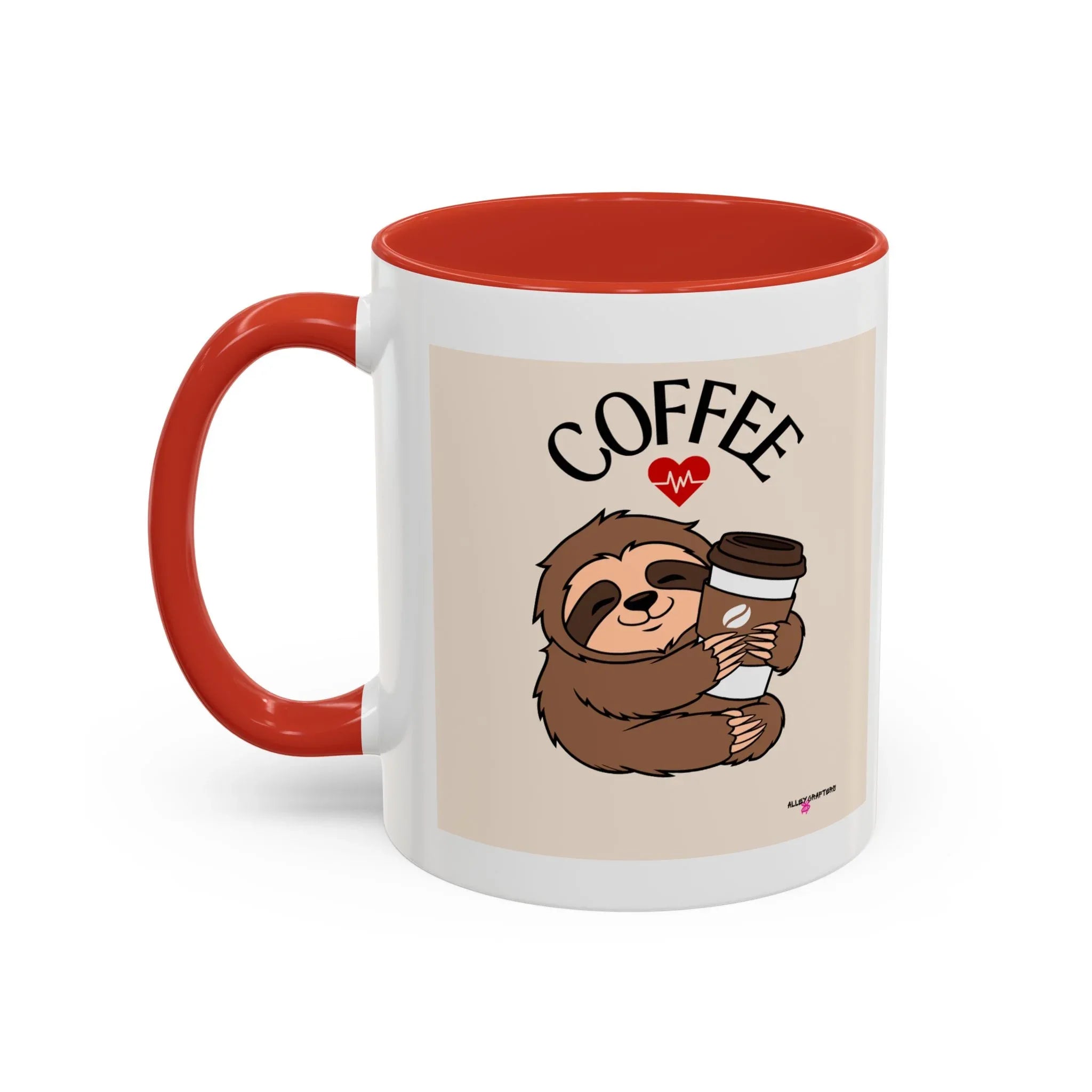 White coffee mug with red interior and handle, sloth graphic holding a coffee cup