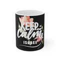 Black ceramic mug with Keep Calm floral design and name "ISABEL" on front.