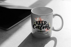 Gray ceramic mug with Keep Calm floral print and name ISABEL