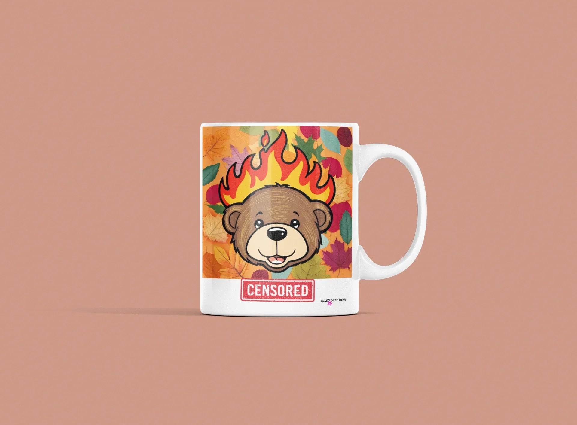 White ceramic bear mug with flames graphic and red “CENSORED” label, front view.