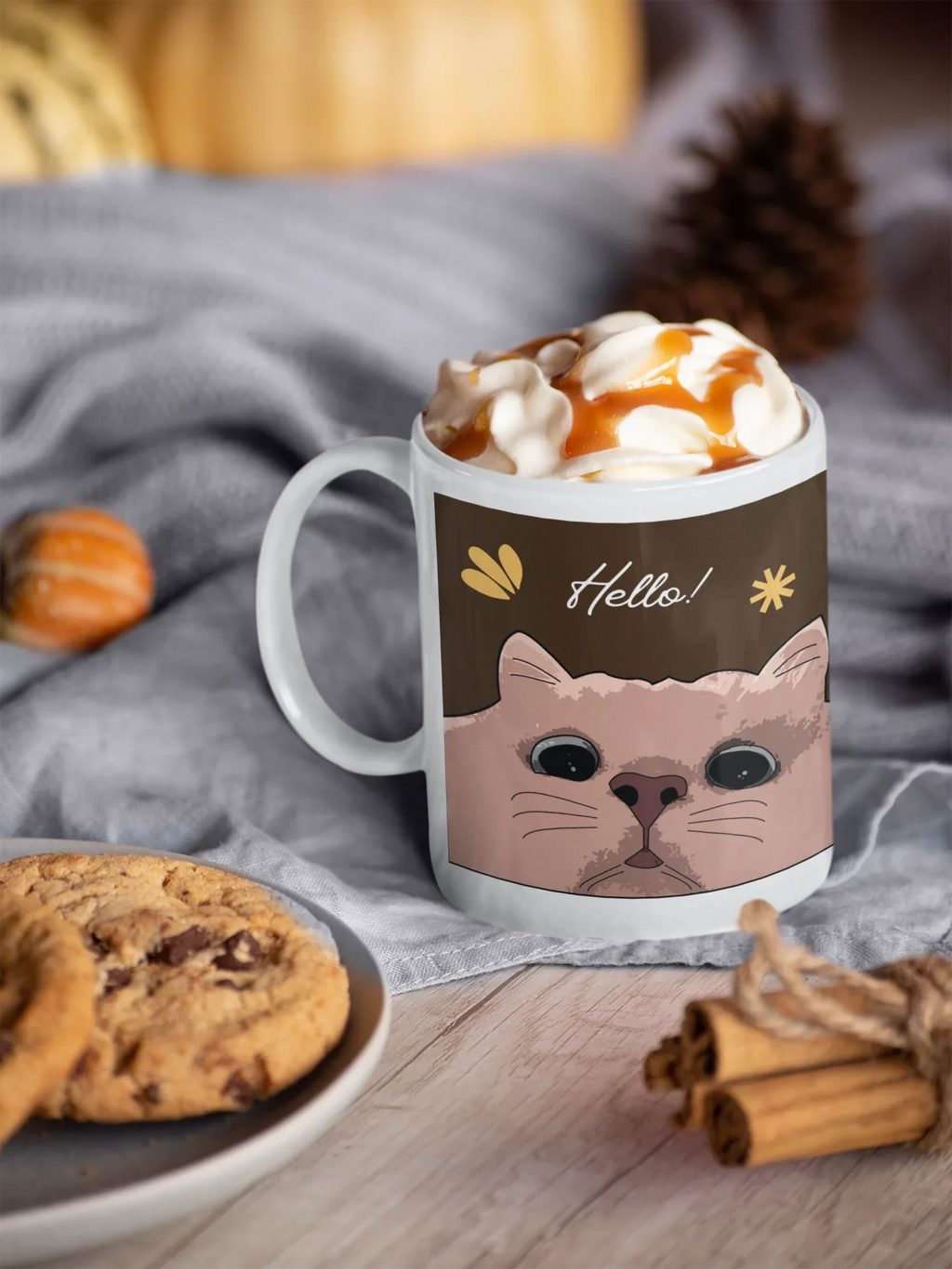 White cat-themed mug with 'Hello!' and cat face graphic, topped with latte foam