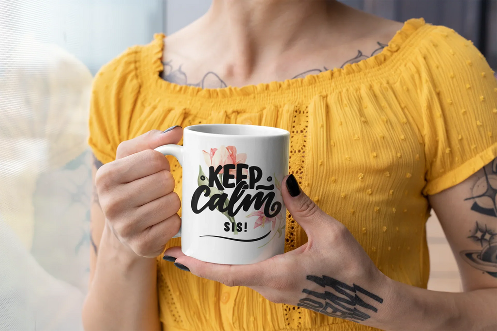 White ceramic mug with Keep Calm floral print and "SIS!" text on front.