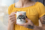 White ceramic mug with Keep Calm floral print and "SIS!" text on front.
