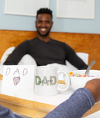White ceramic coffee mug with DAD and Est. 1990 print