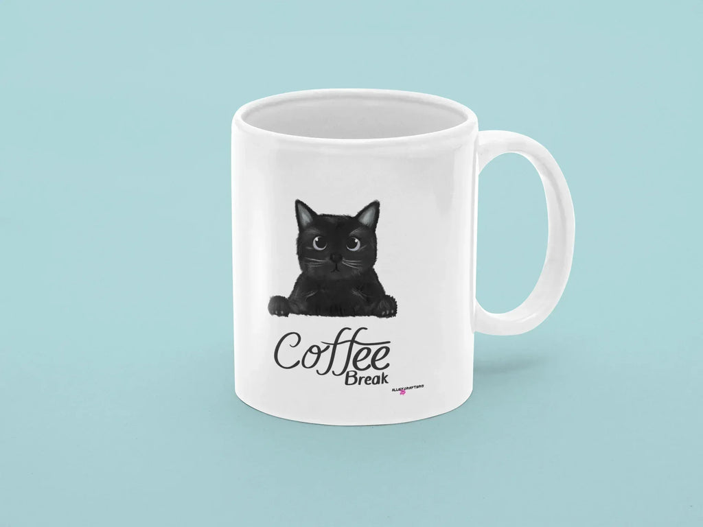 Coffee break mug in white with black cat graphic and “Coffee Break” text; handle visible.