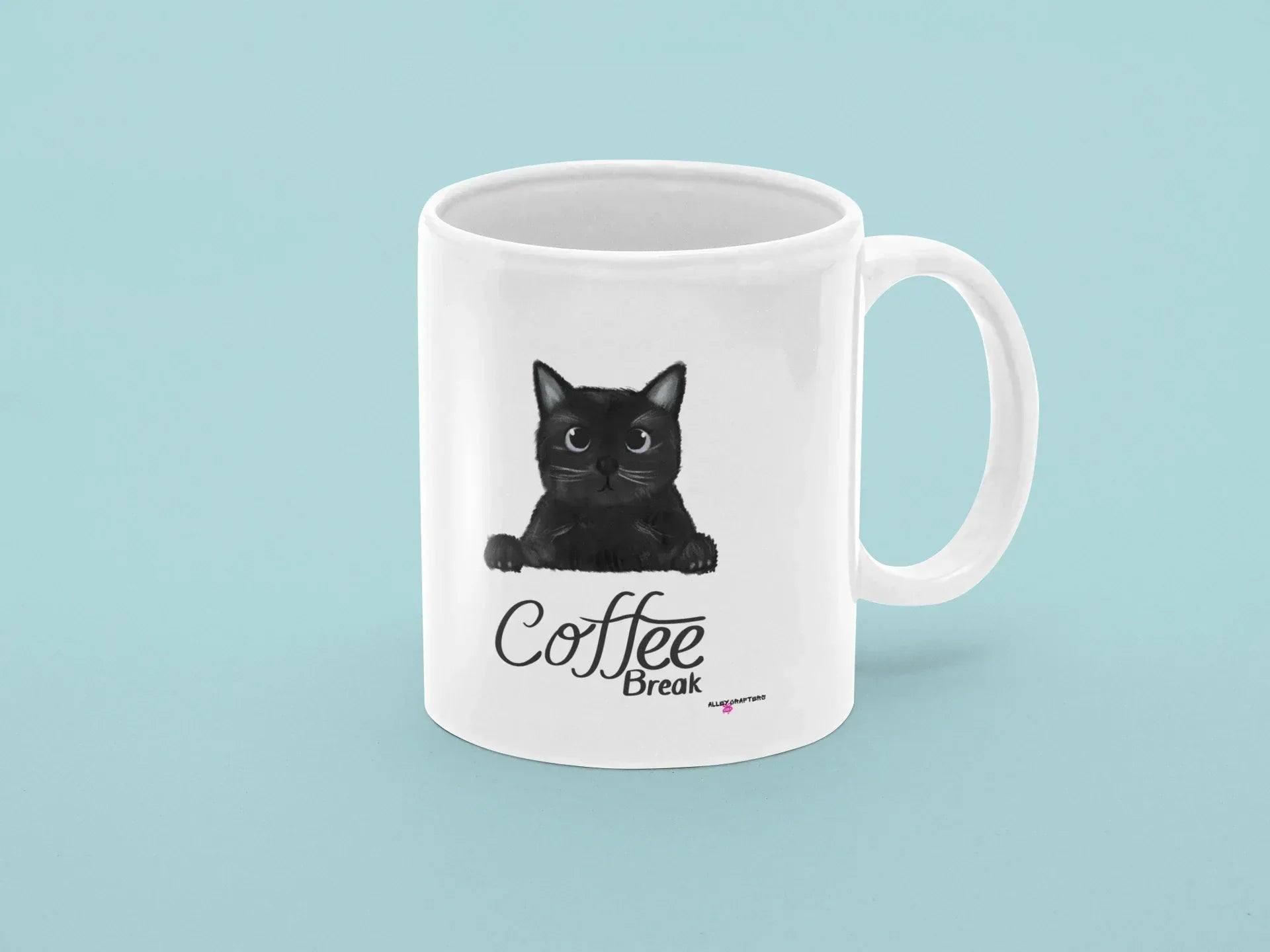 Coffee break mug in white with black cat graphic and “Coffee Break” text; handle visible.