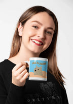 Dog-themed ceramic mug with blue design and “JUST LIVING” text
