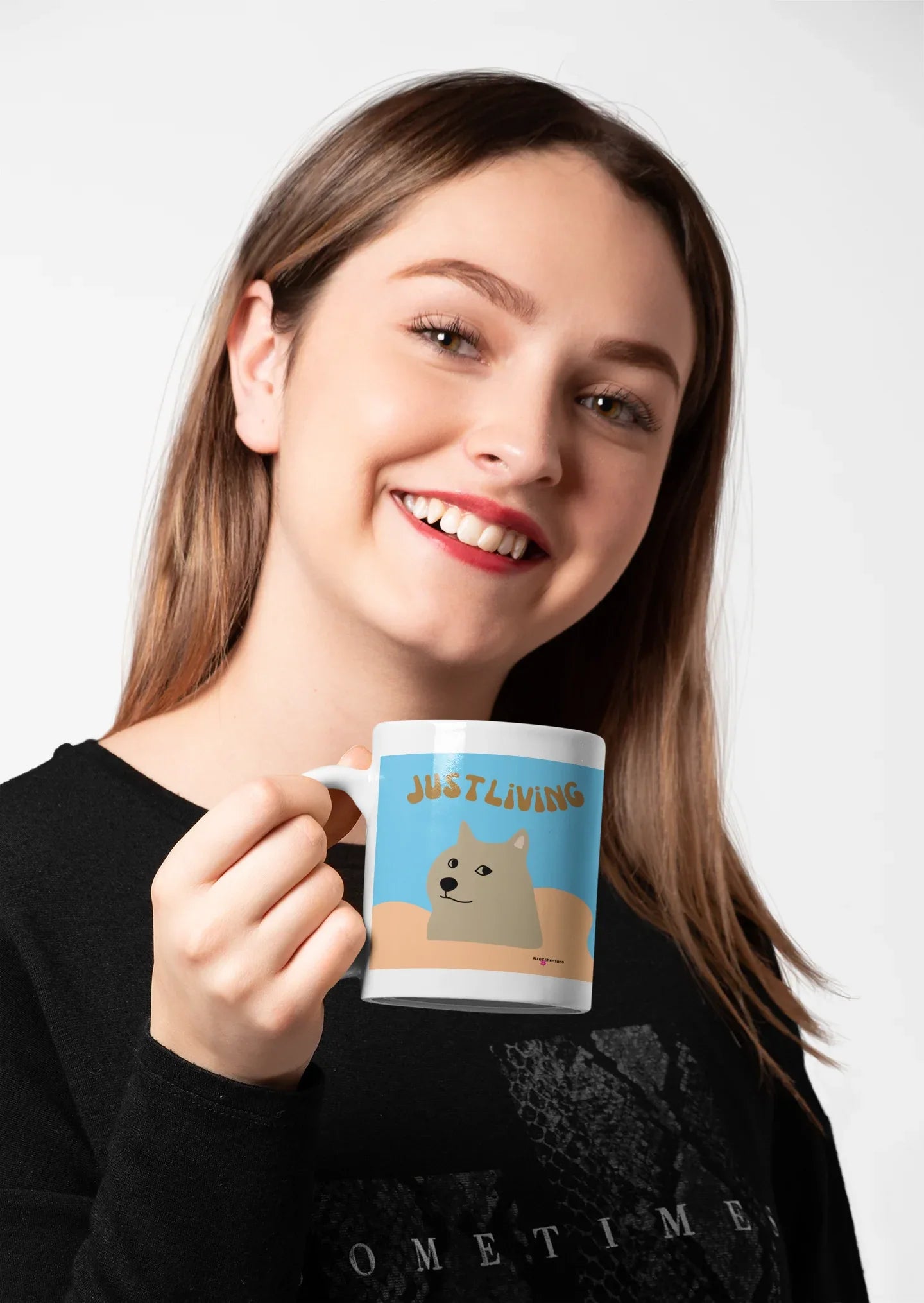 Dog-themed ceramic mug with blue design and “JUST LIVING” text