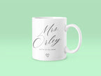 White ceramic mug with 'Mrs Orley' script, 'ESTD 25.02.2024' and small heart