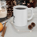 White ceramic coffee mug on a table with black quote text; interior and handle visible.