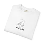 White nature graphic T-shirt with mountain tree logo and 'BY NATURE' text