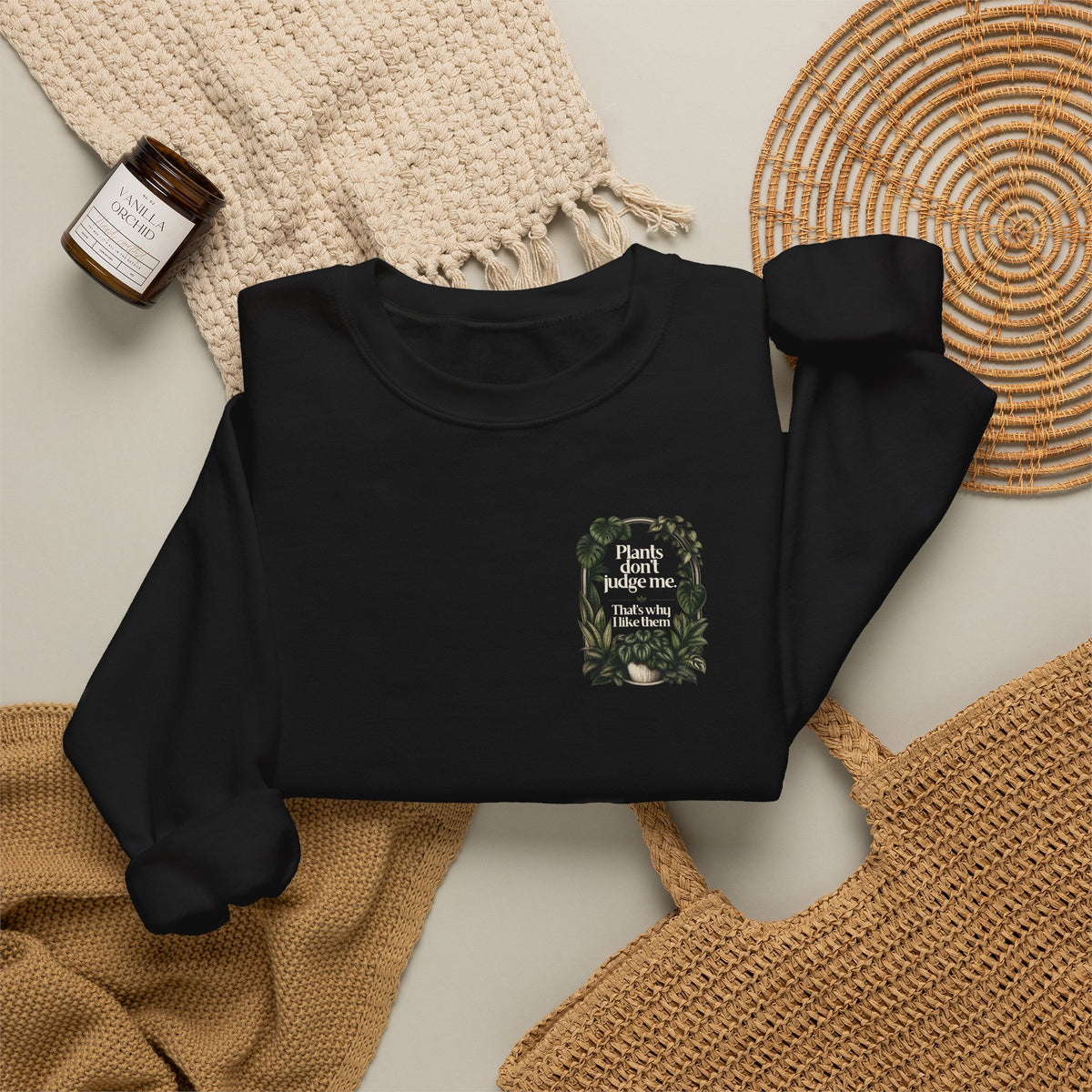 Black crewneck sweatshirt with front plant wreath graphic