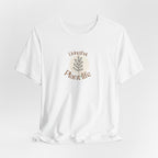 White T-shirt with plant-life graphic and leaf sprig text