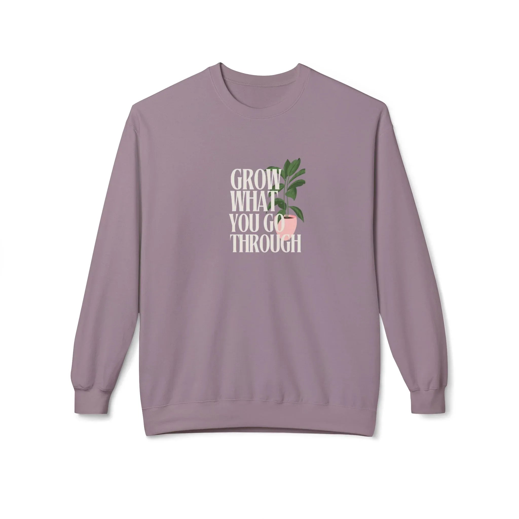 Lavender crewneck sweatshirt with “Grow What You Go Through” graphic and green leaf