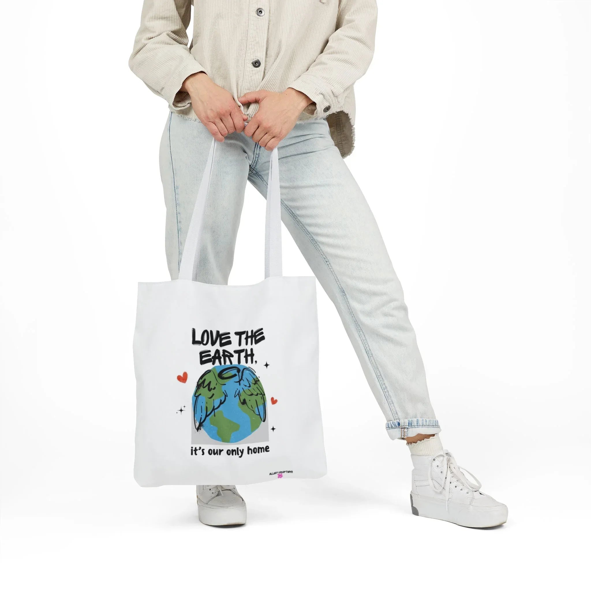 White tote bag with Earth graphic and text Love the Earth, it’s our only home