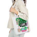 White canvas tote bag with “Self Care” graphic and green frog illustration