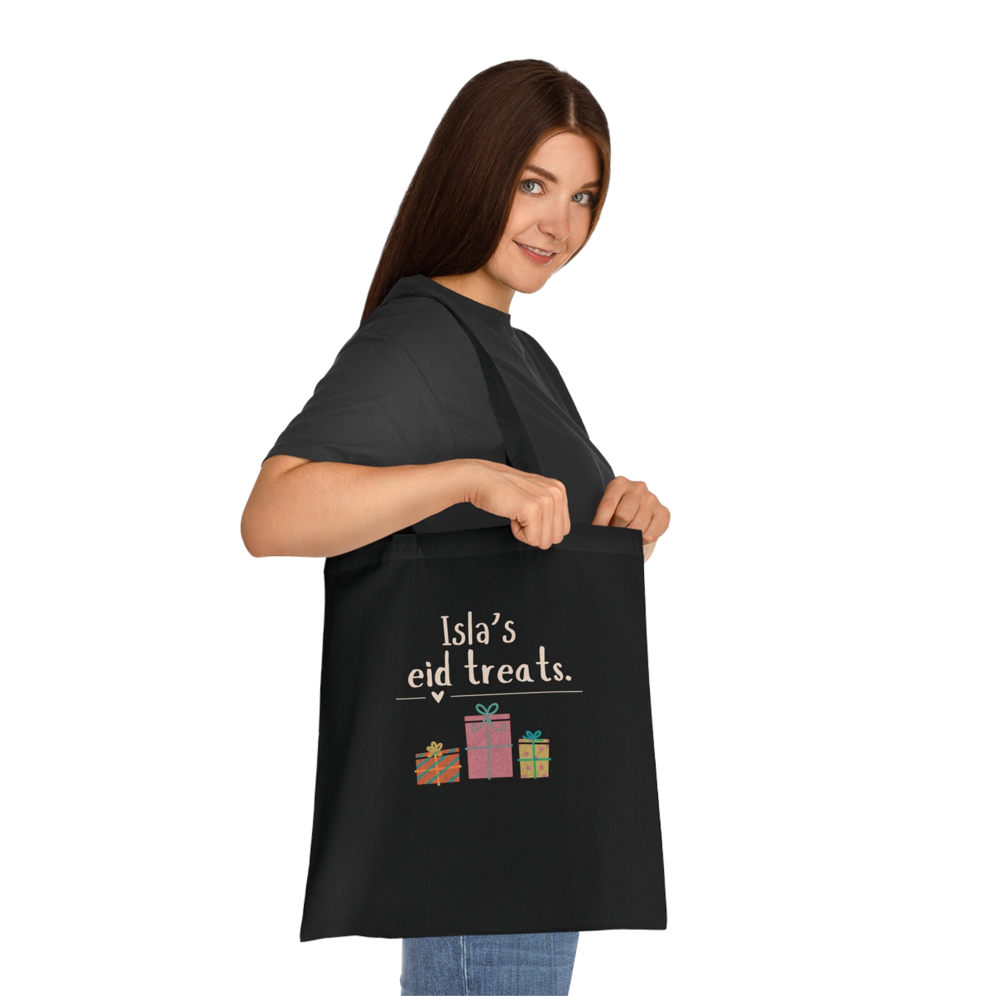Black cotton tote bag with “Isla’s eid treats” text and colorful gift illustration
