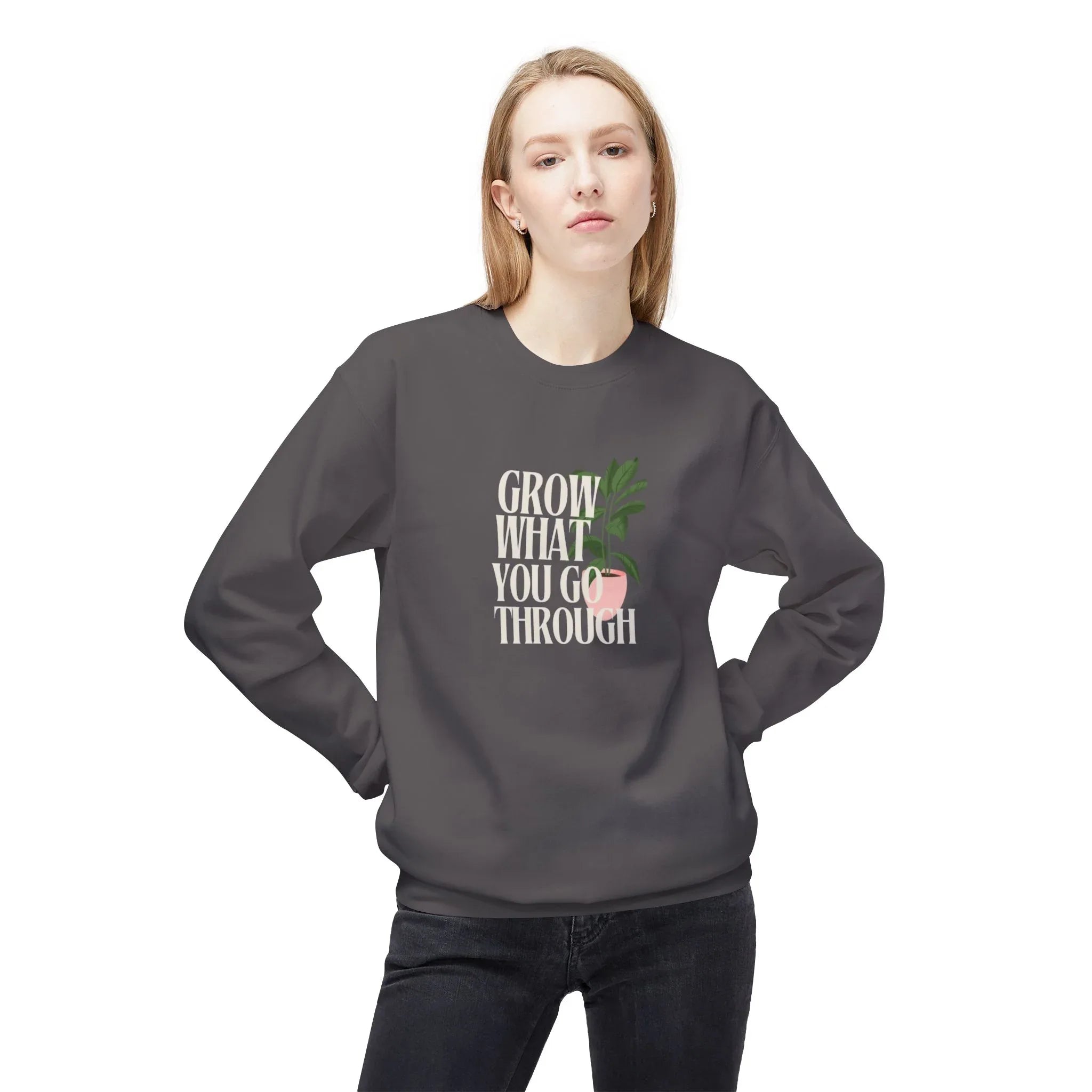 Dark gray sweatshirt with front “Grow What You Go Through” graphic.