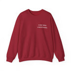 Maroon crewneck sweatshirt with 'a year wiser, a world kinder.' print