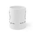 White coffee mug with partial diamond ring and "we said yes" printed on side