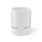 White coffee mug with partial diamond ring and "we said yes" printed on side