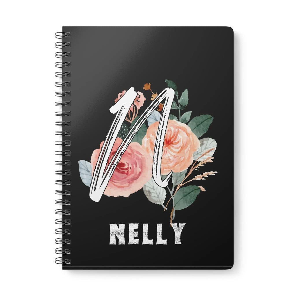 Black wirobound A5 journal with floral initial and name NELLY on the cover