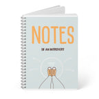 Spiral A5 notebook with light teal cover, black spiral and NOTES design, extra sheets