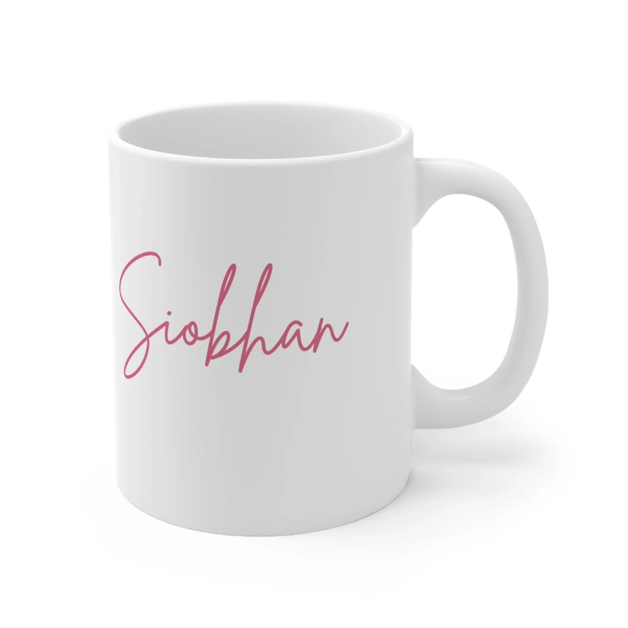 White ceramic mug with pink cursive name Siophan printed on the front.