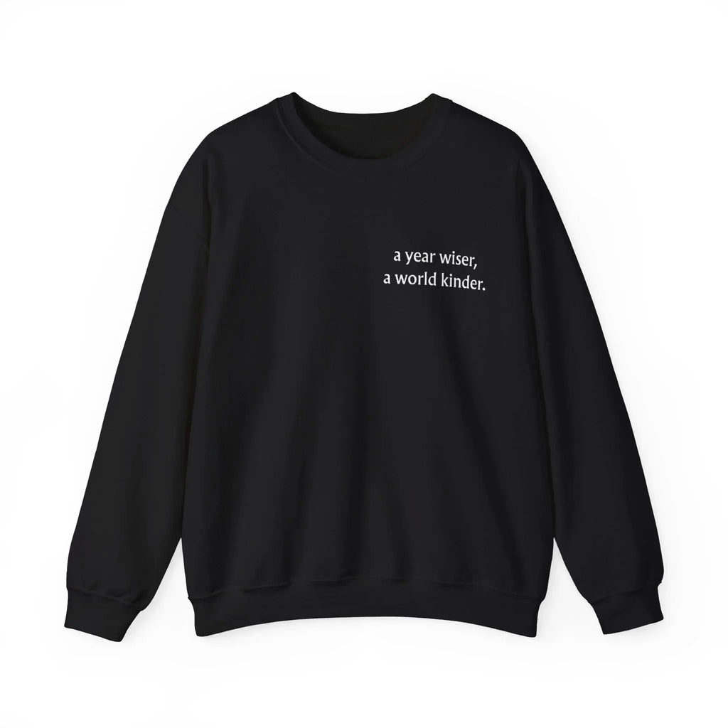Black crewneck sweatshirt with a year wiser, a world kinder print