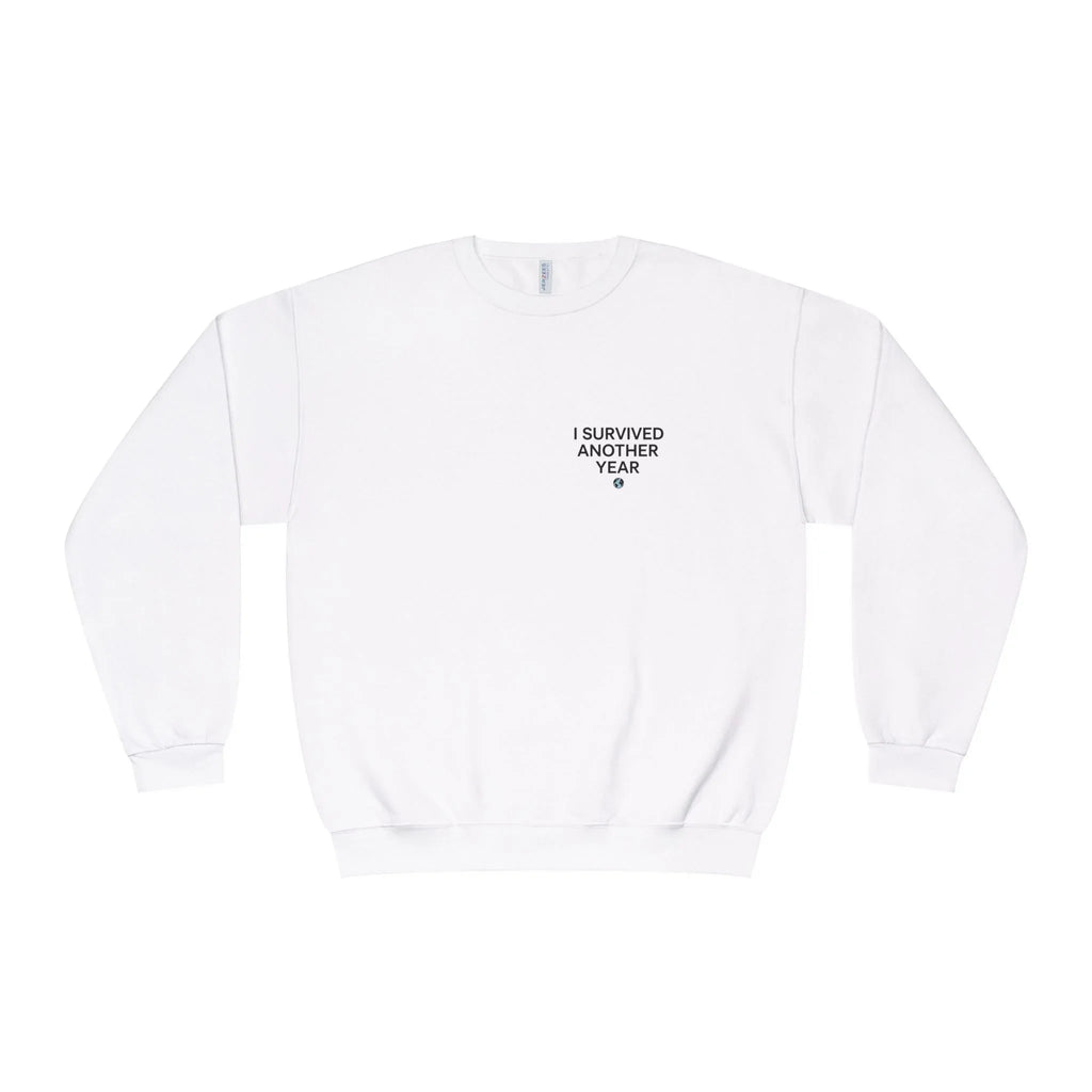White crewneck sweatshirt with small front text reading “I SURVIVED ANOTHER YEAR”
