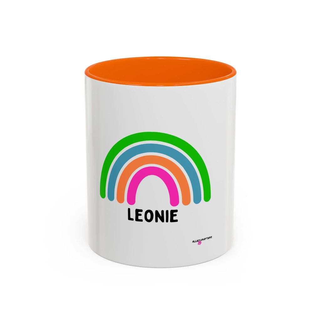 Personalised rainbow mug with LEONIE name, white body with orange rim and rainbow graphic