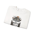 White folded sweatshirt with front mountain quote graphic print