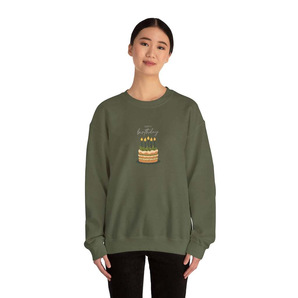 Olive green crewneck sweatshirt with “Happy birthday” cake and candle graphic