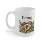 White ceramic mug with handle, Emma name and botanical mushroom illustration.