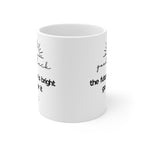 White coffee mug with printed words "good luck" and "the future is bright" on side
