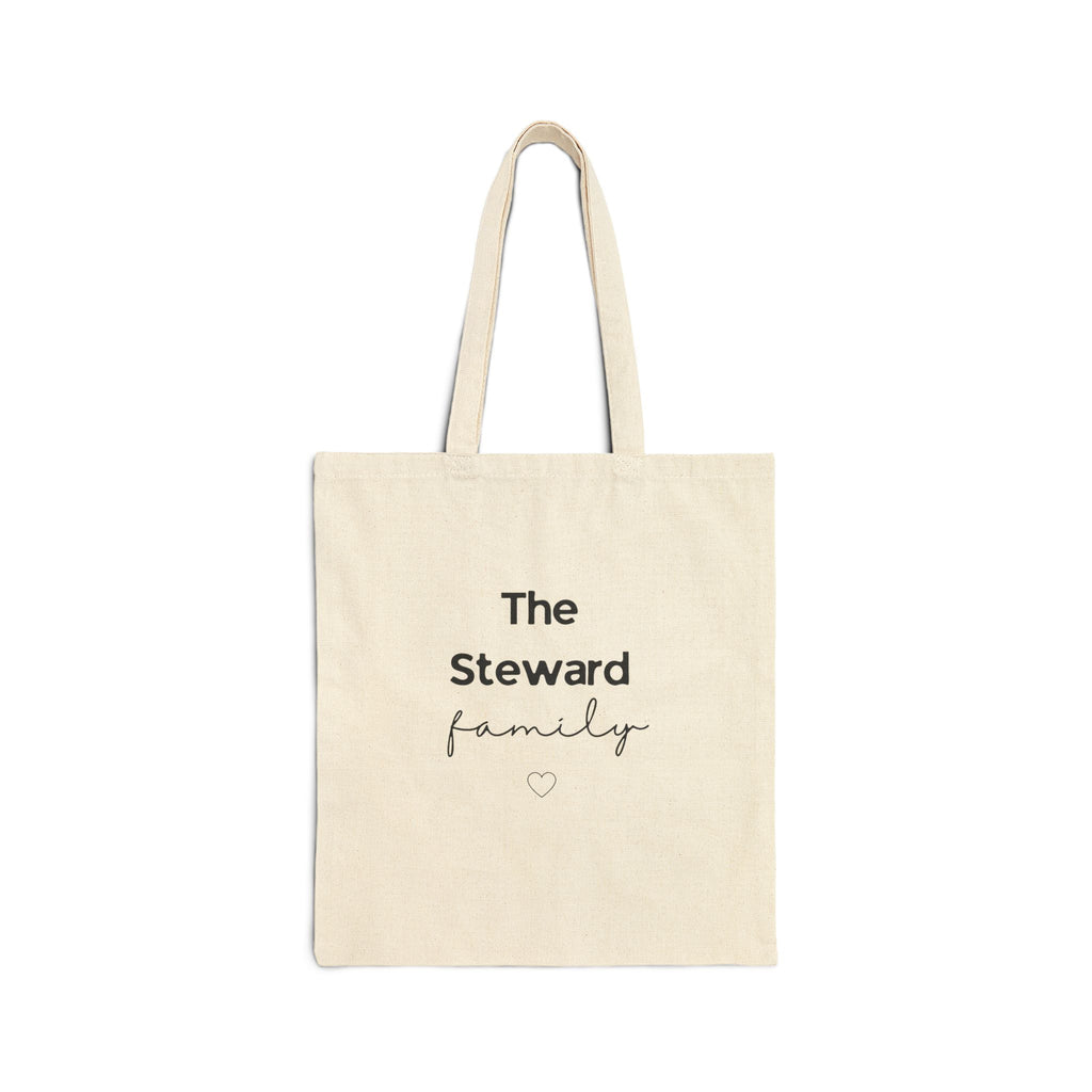 Natural canvas tote bag with handles and “The Steward family” text