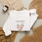 White personalised sweatshirt with floral heart graphic and location text on chest