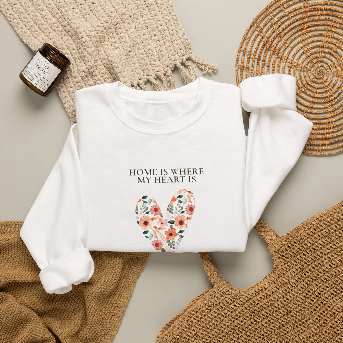 White personalised sweatshirt with floral heart graphic and location text on chest
