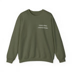 Olive green birthday sweatshirt with 'a year wiser, a world kinder' print
