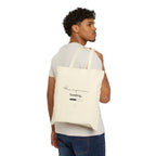 Natural canvas tote bag worn on shoulder, front print "Honeymoon loading..."